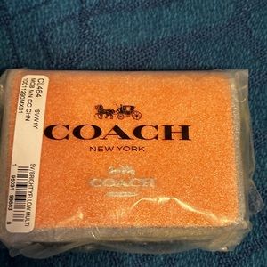 Coach mini chain in wallet